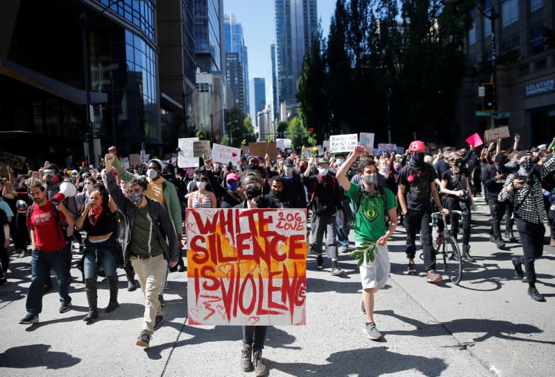 Protesters rally against the death in Minneapolis police custody of George Floyd, in Seattle