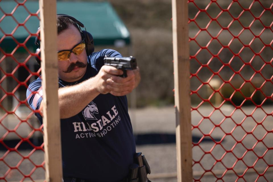 Hillsdale College Senior Zach Steiger, a U.S. Army veteran, takes aim.