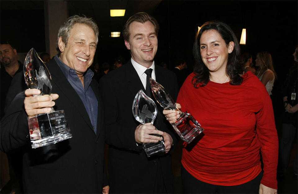 Producer Charles Roven, director Christopher Nolan, and producer Emma Thomas pose backstage during the 35th Annual People's Choice Awards held at the Shrine Auditorium on January 7, 2009 in Los Angeles, California.