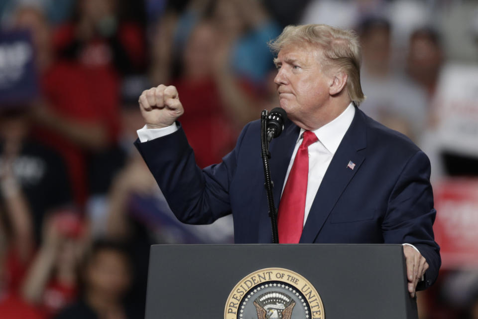 President Donald Trump pumps his fist after speaking during a campaign rally at the Huntington Center, Thursday, Jan. 9, 2020, in Toledo, Ohio. (AP Photo/Tony Dejak)