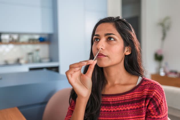 If you have a negative rapid test after five days of isolation and your symptoms have improved, you're clear to end it, according to experts. (Photo: AzmanL via Getty Images)