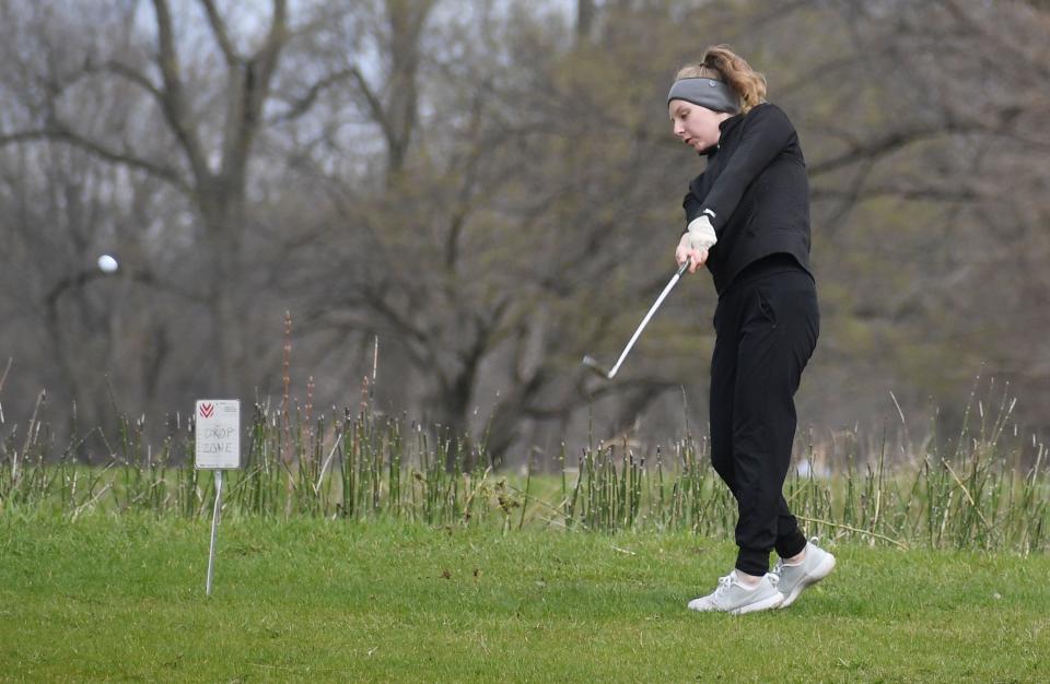 Bryce Bearson and fellow senior Ellie Nusbaum love pestering Ames girls golf coach R.J. Voss with their musical playlist during rides to and from meets.