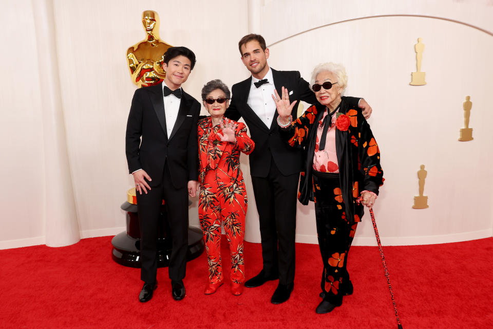 HOLLYWOOD, CALIFORNIA - MARCH 10: (L-R) Sean Wang, Chang Li Hua, Sam Davis and Yi Yan Fuei attend the 96th Annual Academy Awards on March 10, 2024 in Hollywood, California. (Photo by Mike Coppola/Getty Images)