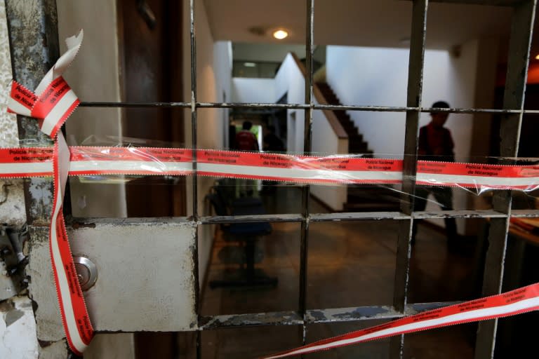 View of the entrance to building of the Center of Investigation on Communication (CINCO) after the NGO was raided in Managua on December 14, 2018