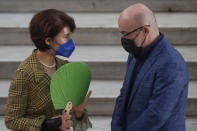 South Korea minister of environment, Han Jeoung-ae is welcomed by Italian Minister for Ecological Transition Roberto Cingolani as she arrives at Palazzo Reale in Naples, Italy, Thursday, July 22, 2021, to take part in a G20 meeting on environment, climate and energy. (AP Photo/Salvatore Laporta)