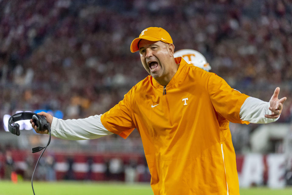 FILE - In this Oct. 19, 2019, file photo, Tennessee head coach Jeremy Pruitt yells at the officials during an NCAA college football game against Alabama in Tuscaloosa, Ala. The SEC came into this season with a contingency plan to deal with coronavirus-related issues. “Obviously, we can’t predict the future,” Tennessee coach Jeremy Pruitt said. “I believe we all knew when we started this, that there were no guarantees.” (AP Photo/Vasha Hunt, File)