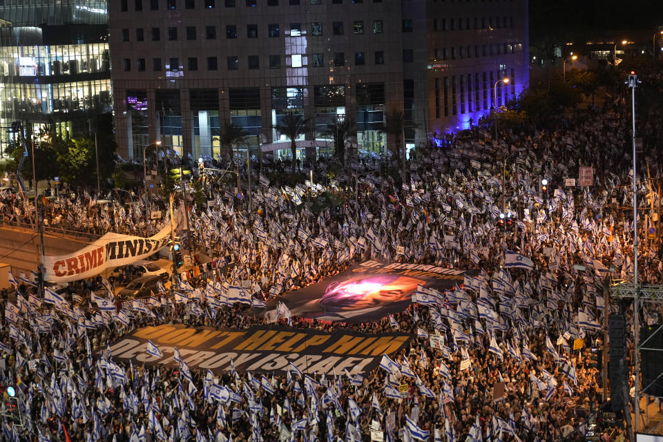 Israelis protest plans by Prime Minister Benjamin Netanyahu's far-right government to overhaul the judicial system, in Tel Aviv, Israel, Saturday, May 27, 2023. (AP Photo/ Ohad Zwigenberg)