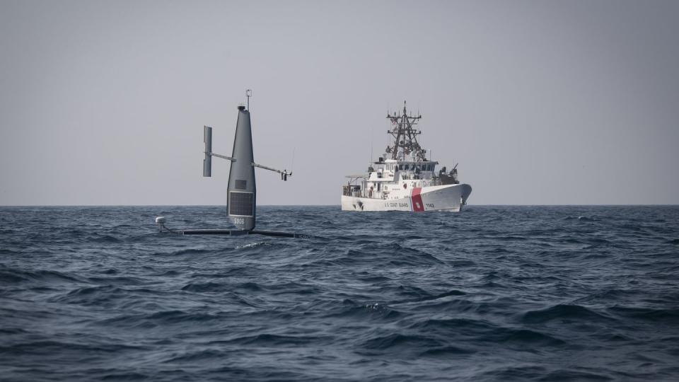 A Saildrone Explorer unmanned surface vessel operates with the U.S. Coast Guard's fast response cutter Robert Goldman in the Arabian Gulf on Oct. 7, 2022. (Chief MC Roland Franklin/U.S. Navy)