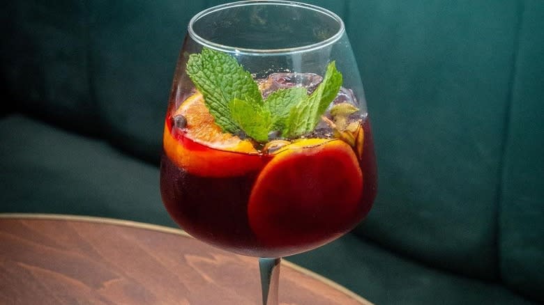 glass of sangria with fruit