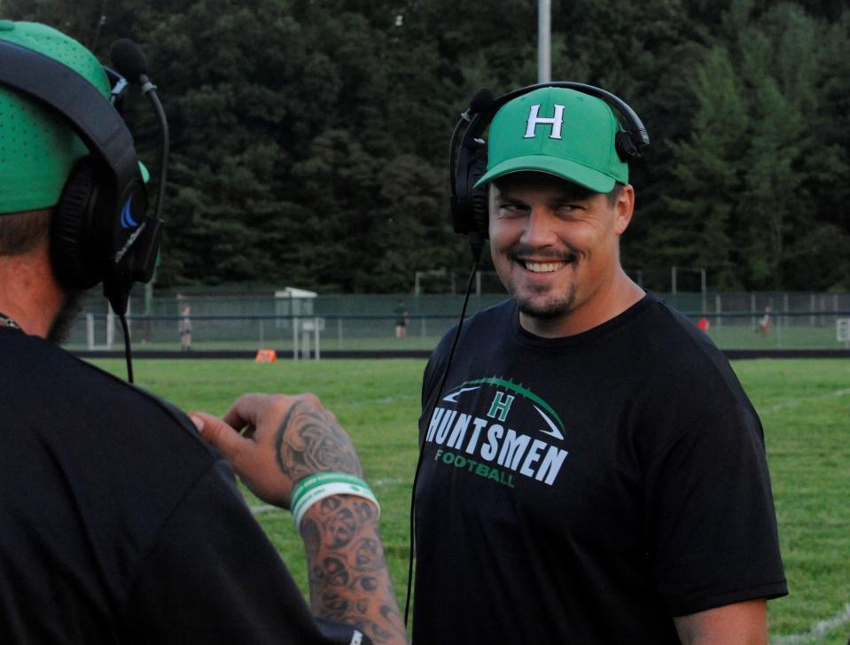 Huntington head football coach Clay Beeler (center) during the Huntsmen's scrimmage against South Gallia on Aug. 3, 2023, in Huntington Township, Ohio.