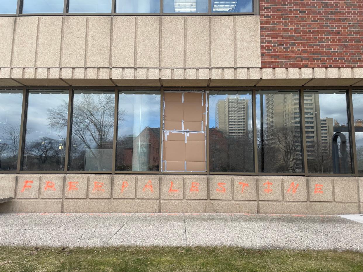 Graffiti on the outside of the University of Wisconsin-Milwaukee's Golda Meir Library on March 17, 2024. Students have pushed for the building to be renamed.