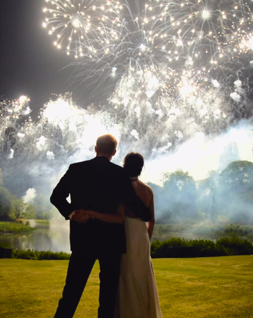 The happy couple watching fireworks over the Frogmore House lake (Netflix)