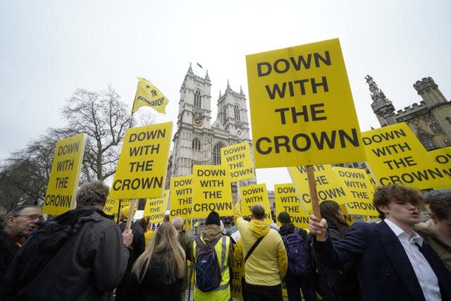 Protesters outside Westminster Abbey in London ahead of the annual Commonwealth Day Service (Lucy North/PA)