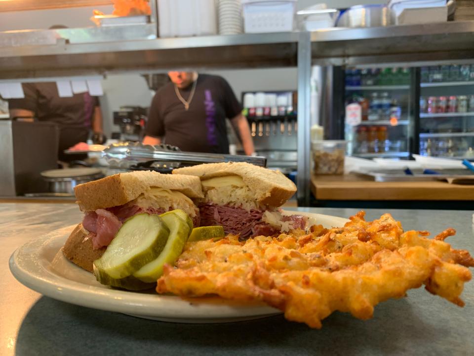 A Reuben and potato cake from Izzy's