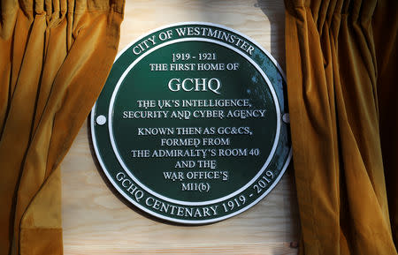 A GCHQ plaque is seen during Britain's Queen Elizabeth's visit at the Watergate House to mark the centenary of the GCHQ (Government Communications Head Quarters) in London, Britain, February 14, 2019. REUTERS/Hannah McKay/Pool