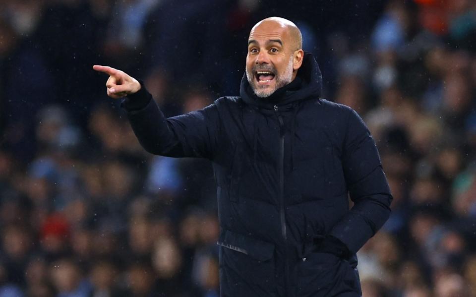 Pep Guardiola on the touchline during Manchester City's match against Tottenham