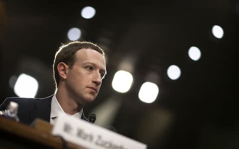 Mark Zuckerberg, chief executive officer and founder of Facebook Inc., listens during a joint hearing of the Senate Judiciary and Commerce Committees in Washington - Credit: Bloomberg