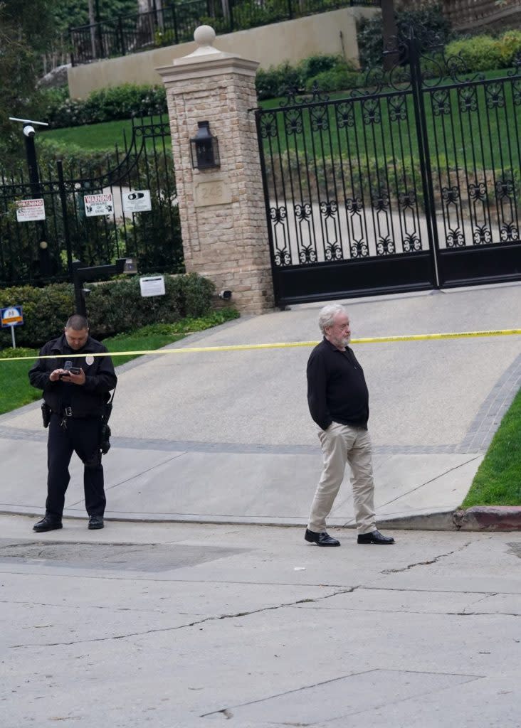 The Hollywood director, 86, was seen speaking to cops while standing behind a cordoned-off area marked with yellow tape. Shabba / BACKGRID