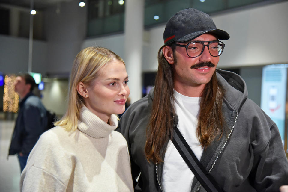 FRANKFURT AM MAIN, GERMANY - JANUARY 09: Fabio Knez and his girlfriend Darya Strelnikova leave for 