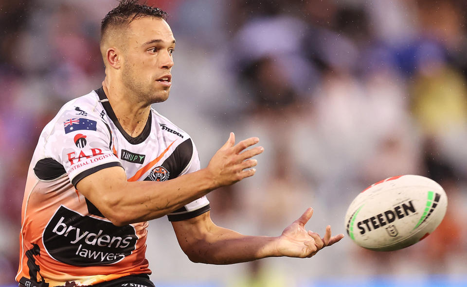 Luke Brooks, pictured here in action for the Wests Tigers against the Manly Sea Eagles.