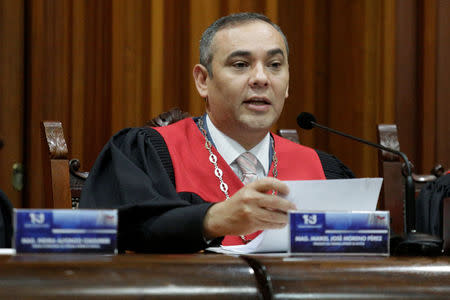 Venezuela's Supreme Court President Maikel Moreno talks to the media during a news conference in Caracas, Venezuela March 27, 2017. REUTERS/Marco Bello