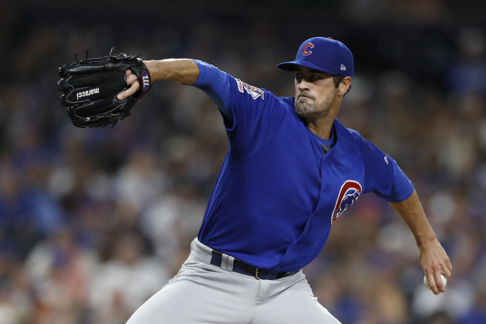 FILE - In this Sept. 11, 2019, file photo, Chicago Cubs pitcher Cole Hamels works against a San Diego Padres batter during the fourth inning of a baseball game in San Diego. The Atlanta Braves need new veteran leadership for a rotation that has lost Julio Teheran and Dallas Keuchel. Left-hander Cole Hamels is eager to fill the void as pitchers and catchers report to spring training on Wednesday, Feb. 12, 2020. (AP Photo/Gregory Bull, File)