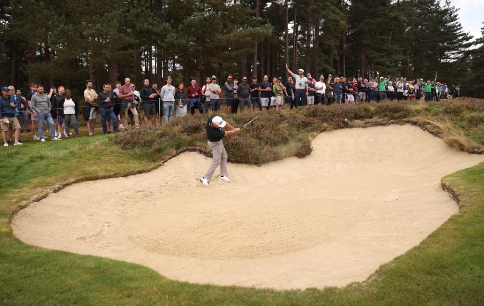 Graeme McDowell plays a shot from a bunker on the 11th during day three of the BMW PGA Championship at Wentworth (Steven Paston/PA) (PA Wire)