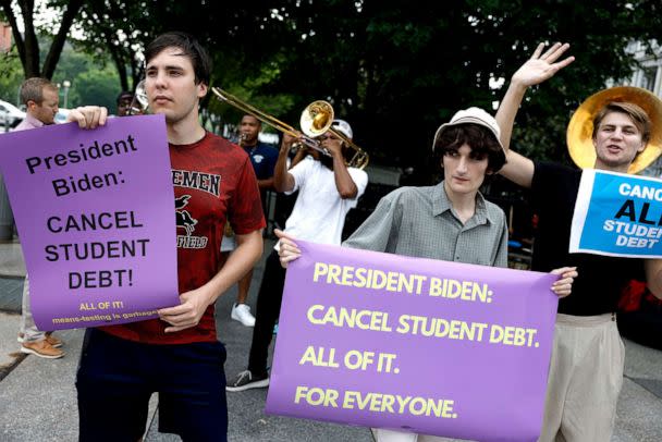 PHOTO: Activists attend a rally outside of the White House to call on U.S. President Joe Biden to cancel student debt in Washington, July 27, 2022. (Anna Moneymaker/Getty Images)