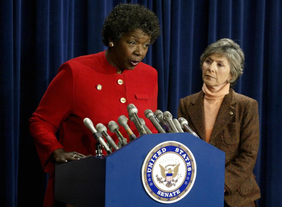 Sen. Barbara Boxer, D-Calif., right, joins Rep. Stephanie Tubbs Jones, D-Ohio, to protest the official electoral vote count in Ohio on Jan. 6, 2005, on Capitol Hill in Washington.