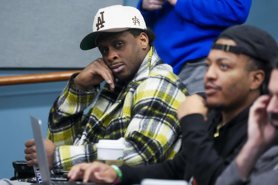 Seattle Seahawks quarterback Geno Smith looks over at reporters as he attends a media availability after it was announced Pete Carroll will not return as head coach next season, Wednesday, Jan. 10, 2024, at the NFL football team's headquarters in Renton, Wash. Carroll will remain with the organization as an advisor. (AP Photo/Lindsey Wasson)