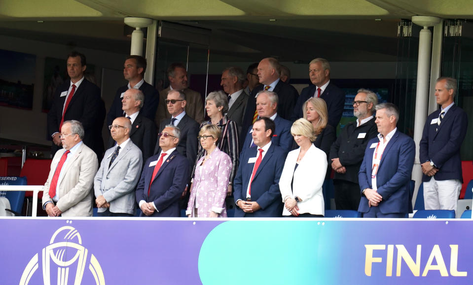 Prime Minister Theresa May (centre, second row) with her husband Philip (second left, second row) and England's chief national cricket selector Ed Smith (far right, second row) in the stands during the ICC World Cup Final at Lord's, London.