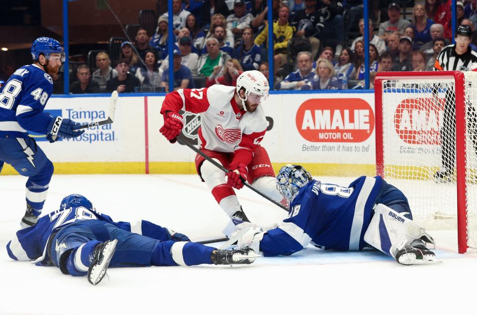 Tampa Bay Lightning goaltender Andrei Vasilevskiy makes a save from Detroit Red Wings center Michael Rasmussen during the second period at Amalie Arena in Tampa, Florida on April 1, 2024.