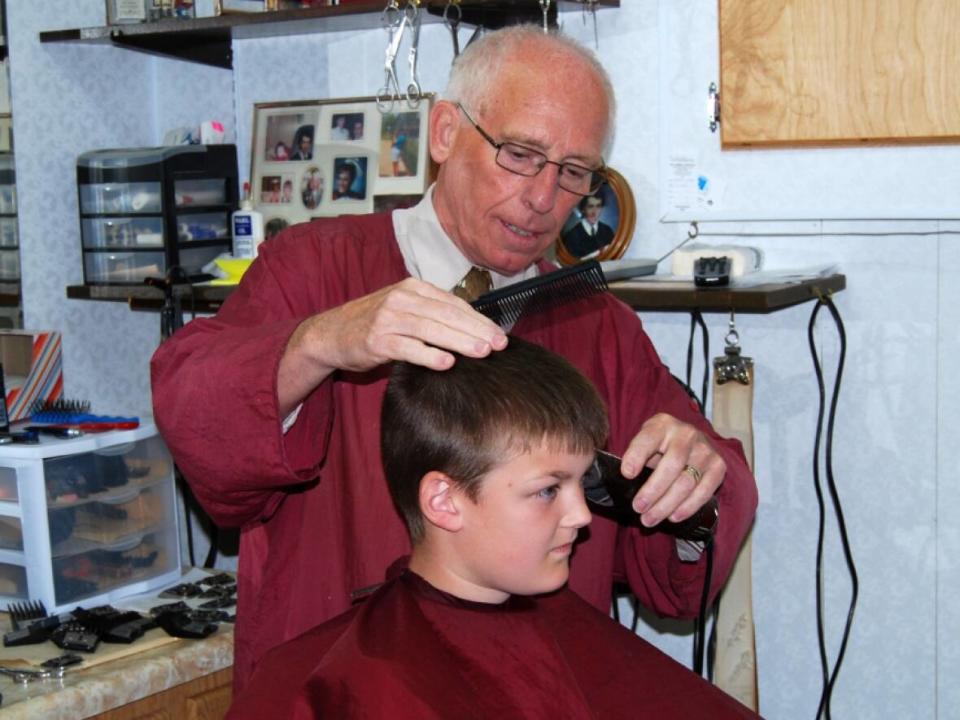 Albert Snook, a barber in Fortune for nearly six decades, died in February at the age of 77. (Allan Stoodley Photography - image credit)