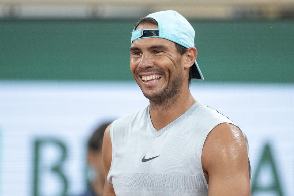 Seen here, Rafael Nadal laughing during his training session in preparation for the 2022 French Open. 