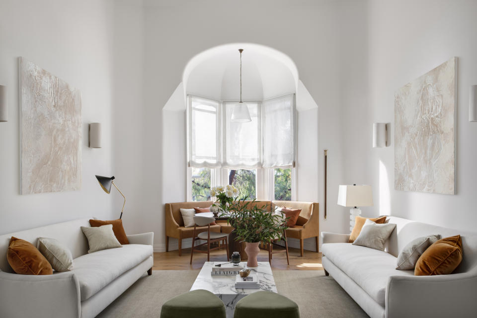 A living room with Roman blinds