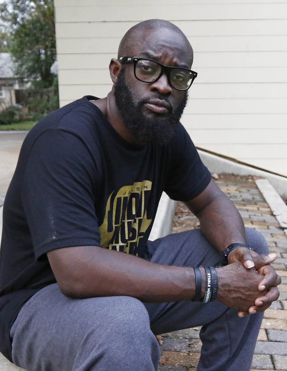 Brad Franklin, of Jackson, Miss., an African-American entrepreneur and rapper who recorded under the name Kamikaze, sits in the Fondren Park amphitheater and says he usually supports Democrats and will vote for Democratic gubernatorial nominee, current Attorney General Jim Hood, Wednesday, Oct. 30, 2019. However, Franklin also says he's put off by Hood using one type of message for black audiences and another for "rural Mississippians." (AP Photo/Rogelio V. Solis)