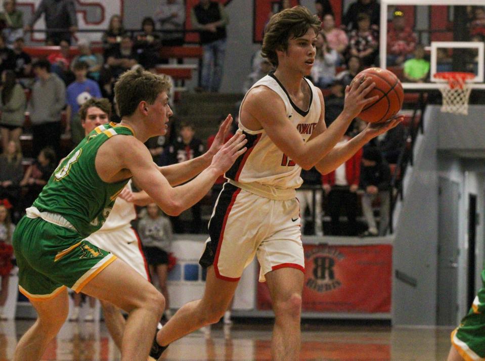 Shallowater's Cooper Lusk looks to pass against Idalou during a District 2-3A boys basketball game on Friday, January 13, 2023 at Shallowater.