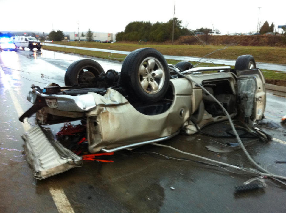 An overturned car in Adairsville, Ga. <a href="http://www.wsbtv.com/" rel="nofollow noopener" target="_blank" data-ylk="slk:(Courtesy of WSB-TV);elm:context_link;itc:0;sec:content-canvas" class="link ">(Courtesy of WSB-TV)</a>