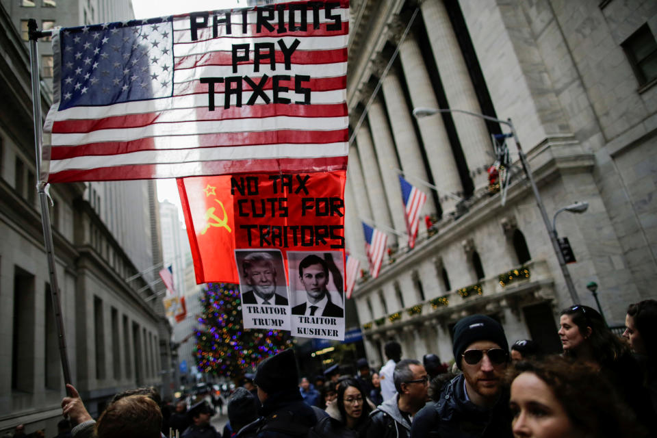 <p>Demonstrators take part in a protest against the U.S. government next to the New York Stock Exchange at the Manhattan borough in New York, Dec. 2, 2017. (Photo: Eduardo Munoz/Reuters) </p>