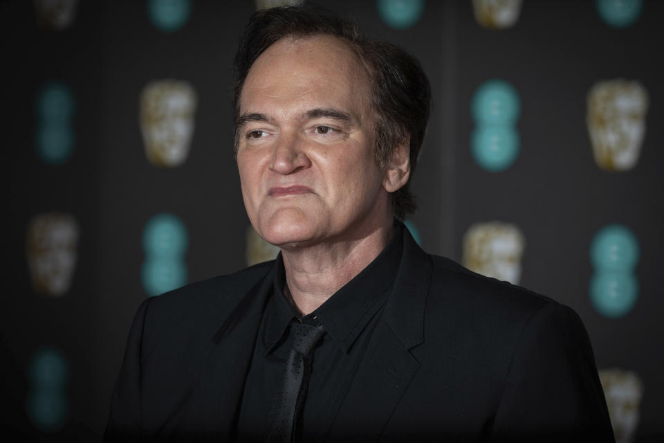 Director Quentin Tarantino poses for photographers upon arrival at the Bafta Film Awards, in central London, Sunday, Feb. 2 2020. (Photo by Vianney Le Caer/Invision/AP)