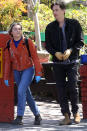 <p>Florence Pugh and Zach Braff keep their hands covered during a walk in Los Angeles on Saturday.</p>