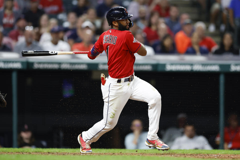 Cleveland Guardians' Amed Rosario watches his RBI single off Detroit Tigers relief pitcher Alex Lange during the eighth inning of a baseball game Wednesday, Aug. 17, 2022, in Cleveland. (AP Photo/Ron Schwane)