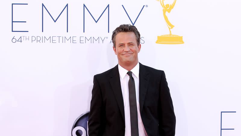 Matthew Perry arrives at the 64th Primetime Emmy Awards at the Nokia Theatre on Sunday, Sept. 23, 2012, in Los Angeles.