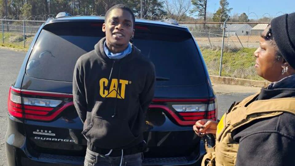 A Jefferson County Sheriff's Office investigator, right, stands next to escapee Jatonia Bryant, 23, following his arrest on Monday in Pine Bluff, Arkansas. - Captain Yohance Brunson/Jefferson County Sheriff's Office