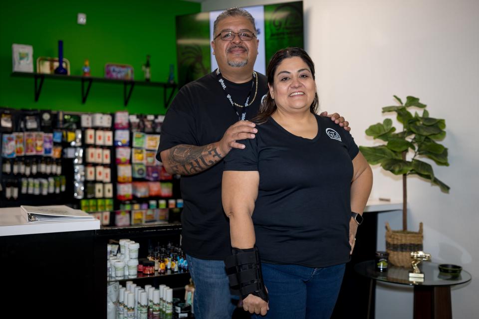 James and Christina Perez, owners of Green Therapy Dispensary in Chaparral, New Mexico, stand inside their dispensary on Friday, Jan. 19, 2024, located at 460 S County Line Dr. F.