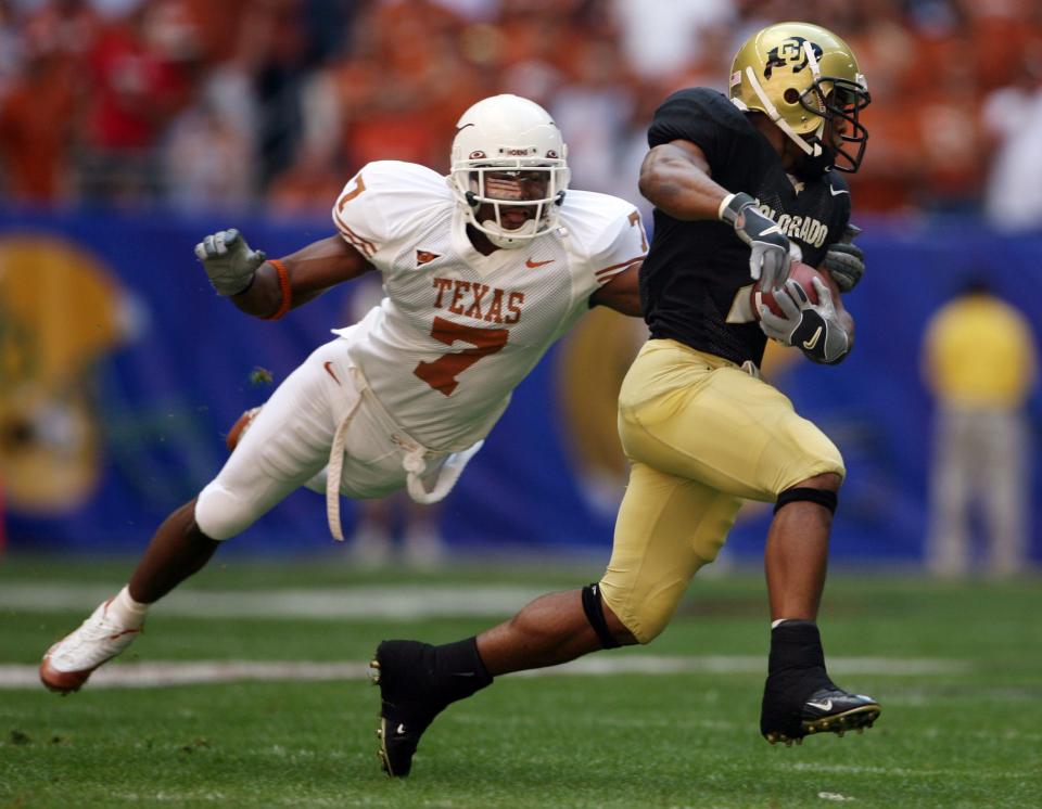 Texas safety Michael Huff chases down Colorado running back Hugh Charles during the 2005 Big 12 championship game. Huff is one of two Longhorns who have won the Thorpe Award, given each year to the nation's best defensive back.