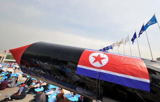 A mock North Korean missile is pictured during a rally denouncing North Korea's nuclear test and its recent missile launches, at the War Memorial of Korea in Seoul, in 2009. North Korea has invited UN inspectors to monitor a nuclear deal with the United States, insisting the pact remains in force despite its shock announcement of an upcoming satellite launch