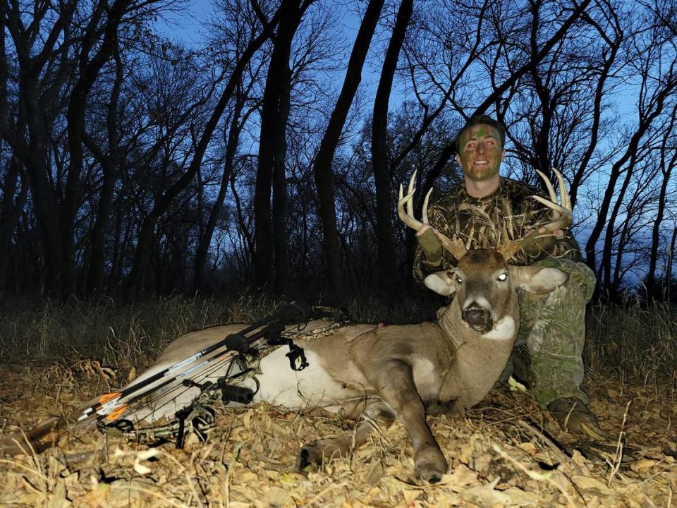 Michael Stavola poses with his Kansas white-tailed buck in 2022. The 10-pointer had a cut above its eye from fighting during the rut.