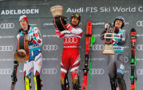 Alpine Skiing - Alpine Skiing World Cup - Men's Slalom - Adelboden, Switzerland - January 13, 2019 Austria's Marcel Hirscher celebrates winning the Men's Slalom with second place France's Clement Noel and third place Norway's Henrik Kristoffersen REUTERS/Stefan Wermuth