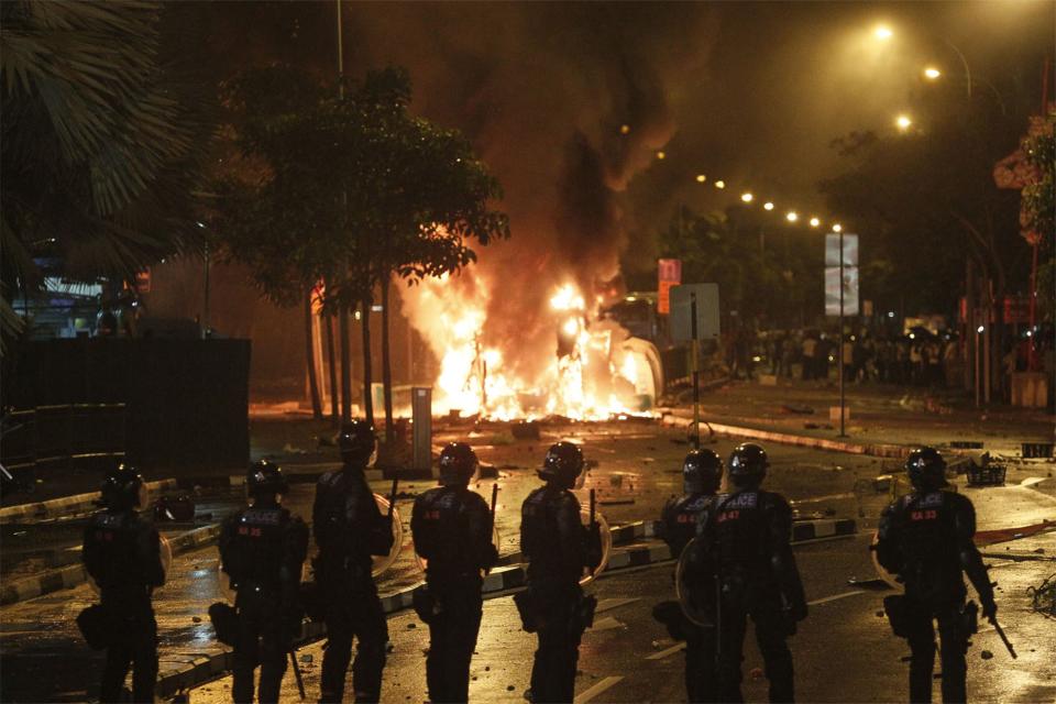 Malaysian detained over Singapore riot, 5 others injured